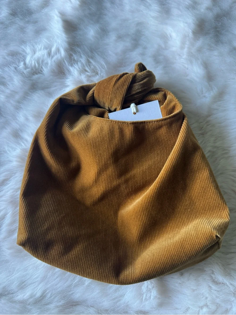 Merit Knot-Handle Cosmetic Bag in Camel